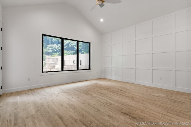 3917 S Madison Ave, Tulsa, OK 74105 - spare room with light wood finished floors, a ceiling fan, recessed lighting, high vaulted ceiling, and baseboards