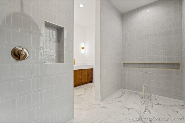3917 S Madison Ave, Tulsa, OK 74105 - full bathroom featuring marble tiled floors and vanity