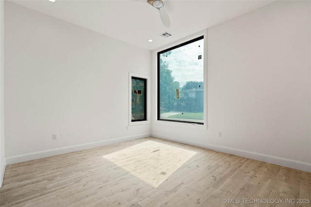3917 S Madison Ave, Tulsa, OK 74105 - unfurnished room with wood finished floors, baseboards, a ceiling fan, and recessed lighting