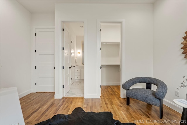 3917 S Madison Ave, Tulsa, OK 74105 - sitting room featuring wood finished floors and baseboards