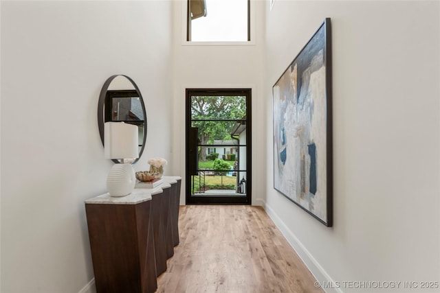 3917 S Madison Ave, Tulsa, OK 74105 - entrance foyer featuring light wood-style floors and a high ceiling