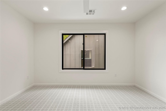 3917 S Madison Ave, Tulsa, OK 74105 - spare room with carpet floors and recessed lighting