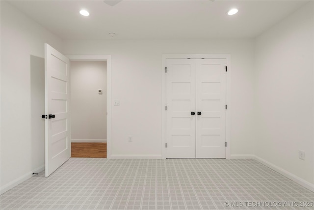 3917 S Madison Ave, Tulsa, OK 74105 - unfurnished bedroom with light carpet, recessed lighting, and a closet