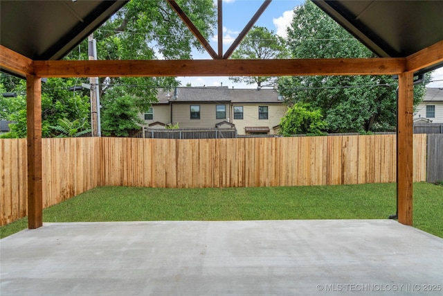 3917 S Madison Ave, Tulsa, OK 74105 - fenced backyard with a patio