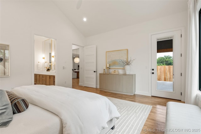 3917 S Madison Ave, Tulsa, OK 74105 - bedroom with access to exterior, wood finished floors, recessed lighting, ensuite bathroom, and high vaulted ceiling