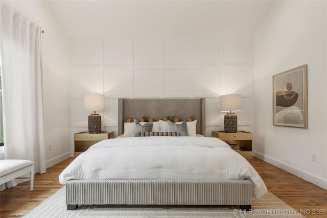 3917 S Madison Ave, Tulsa, OK 74105 - bedroom with wood finished floors and baseboards