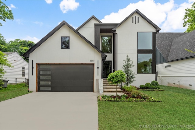 3917 S Madison Ave, Tulsa, OK 74105 - view of front of house with concrete driveway, stucco siding, and a front lawn
