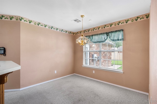 1940 Timberton Rd, Sapulpa, OK 74066 - unfurnished dining area featuring a chandelier, carpet flooring, and baseboards