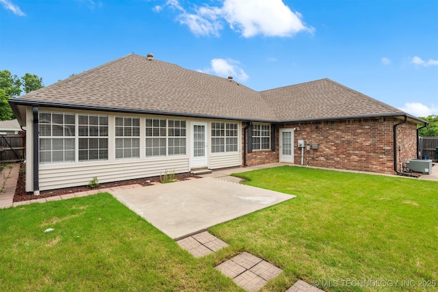 1940 Timberton Rd, Sapulpa, OK 74066 - back of property with a patio area, a shingled roof, brick siding, and central AC unit
