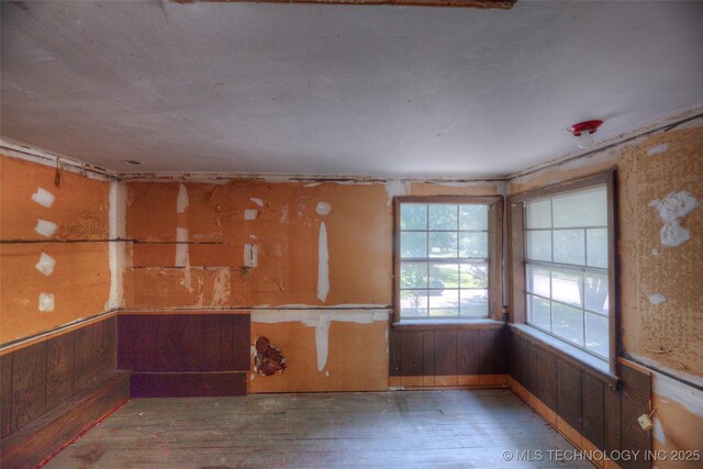 234 E Freeport St, Broken Arrow, OK 74012 - spare room featuring hardwood / wood-style floors