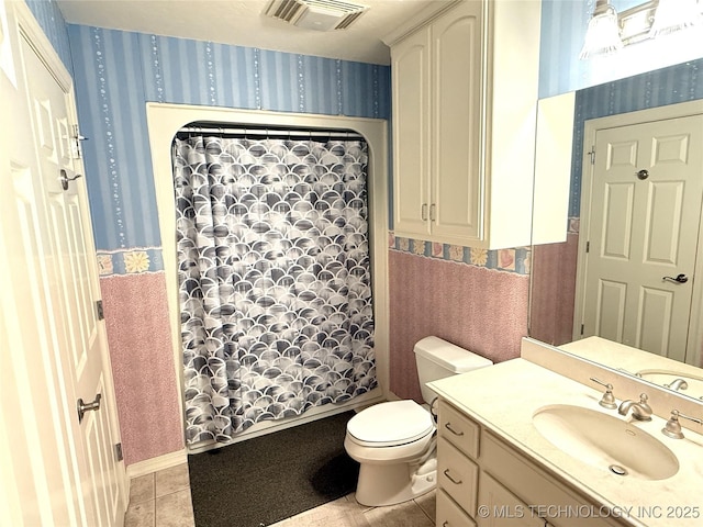 4224 S 69th W Ave, Tulsa, OK 74107 - full bathroom featuring wallpapered walls, vanity, toilet, tile patterned floors, and curtained shower