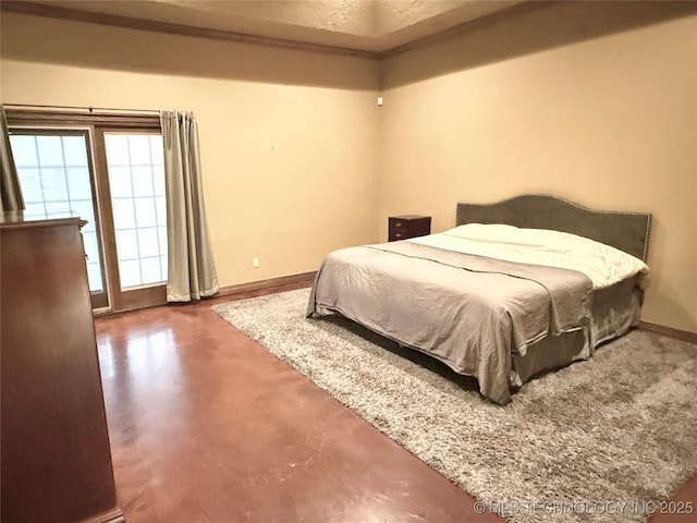 4224 S 69th W Ave, Tulsa, OK 74107 - bedroom featuring baseboards and concrete floors