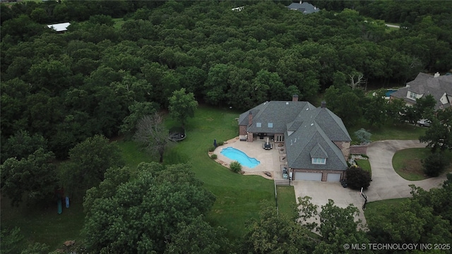 4224 S 69th W Ave, Tulsa, OK 74107 - aerial view of property's location with a heavily wooded area and a pool