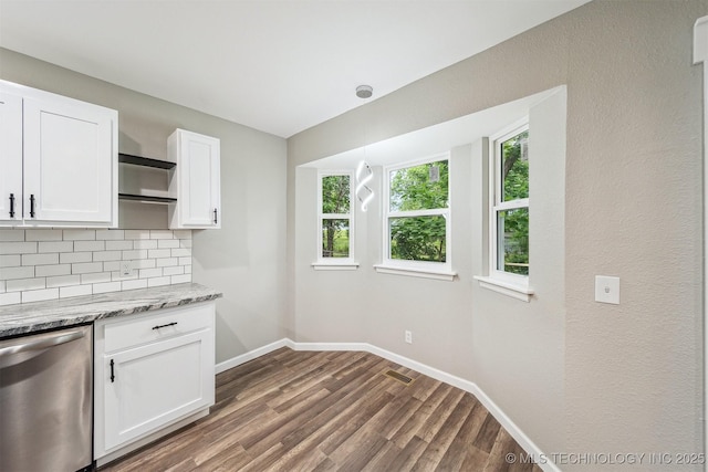 602 S Sunset Dr, Claremore, OK 74017 - kitchen featuring dishwasher, tasteful backsplash, baseboards, white cabinets, and dark wood finished floors