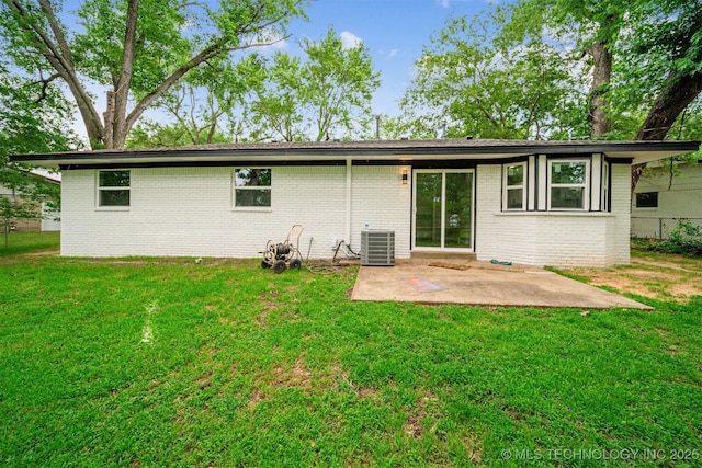 602 S Sunset Dr, Claremore, OK 74017 - back of house featuring a patio area, brick siding, and central AC