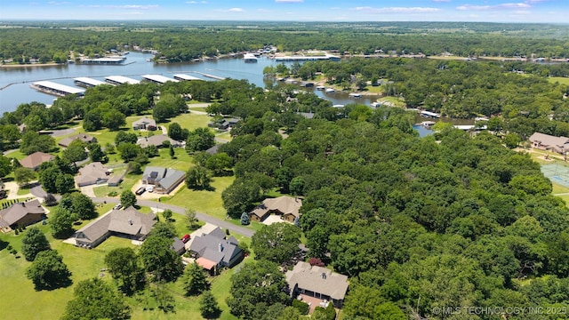 33268 Cardinal Dr, Afton, OK 74331 - drone / aerial view of a nearby body of water and a heavily wooded area