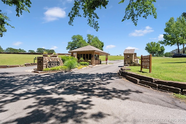 33268 Cardinal Dr, Afton, OK 74331 - view of asphalt road featuring a gated entry