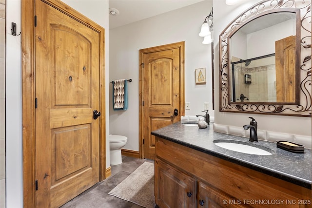 33268 Cardinal Dr, Afton, OK 74331 - bathroom featuring vanity, toilet, a shower, and tile patterned flooring