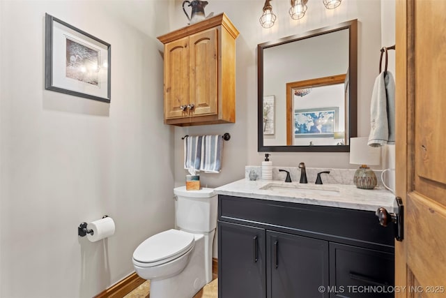 33268 Cardinal Dr, Afton, OK 74331 - bathroom featuring toilet, vanity, and baseboards