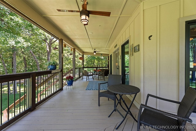33268 Cardinal Dr, Afton, OK 74331 - wooden porch featuring a ceiling fan