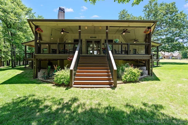 33268 Cardinal Dr, Afton, OK 74331 - rear view of property with stairway, a ceiling fan, a chimney, and french doors