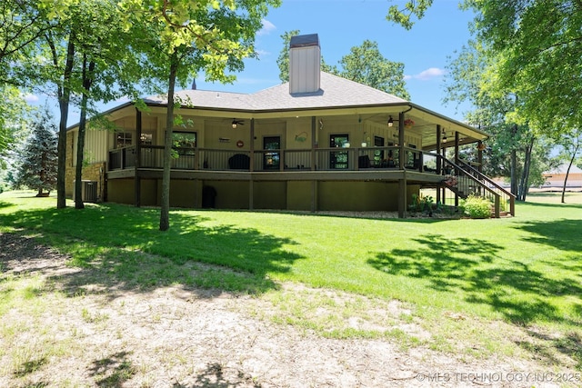 33268 Cardinal Dr, Afton, OK 74331 - back of house featuring ceiling fan, a chimney, and a yard