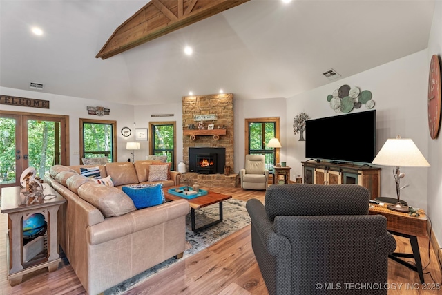 33268 Cardinal Dr, Afton, OK 74331 - living room featuring a fireplace, french doors, light wood-type flooring, and recessed lighting