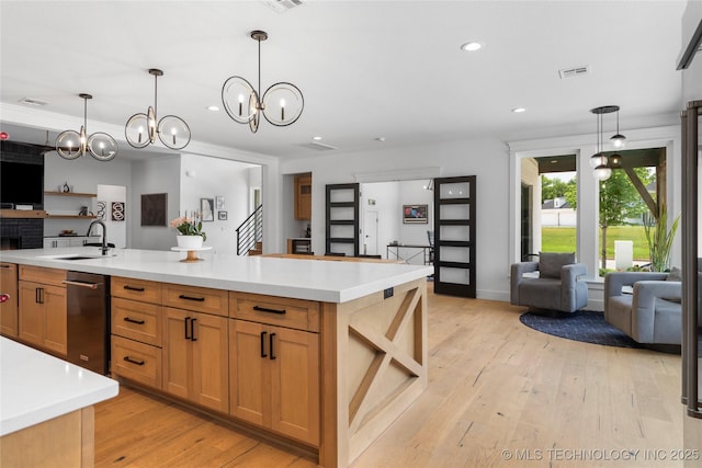 7408 E College St, Broken Arrow, OK 74014 - kitchen with a sink, open floor plan, light wood-style flooring, light countertops, and recessed lighting