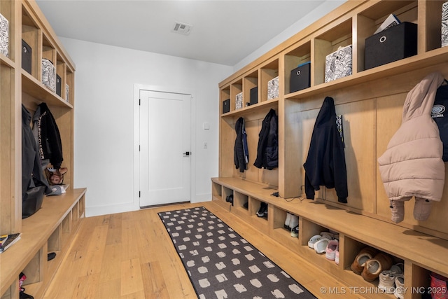 7408 E College St, Broken Arrow, OK 74014 - mudroom with light wood-type flooring and baseboards