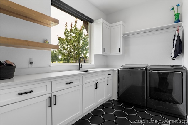 7408 E College St, Broken Arrow, OK 74014 - laundry room with separate washer and dryer, cabinet space, and dark tile patterned floors