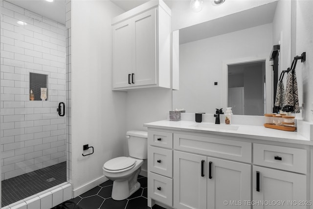 7408 E College St, Broken Arrow, OK 74014 - bathroom with toilet, a stall shower, vanity, tile patterned floors, and baseboards