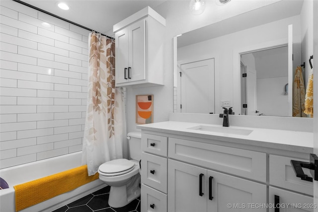 7408 E College St, Broken Arrow, OK 74014 - bathroom with vanity, toilet, tile patterned floors, shower / bath combo, and recessed lighting