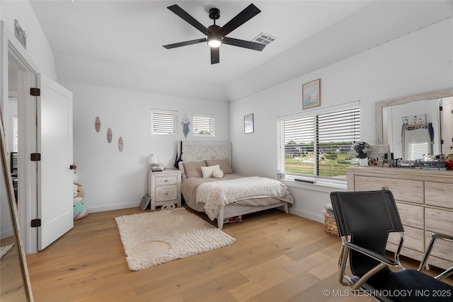 7408 E College St, Broken Arrow, OK 74014 - bedroom with light wood finished floors, baseboards, vaulted ceiling, and ceiling fan