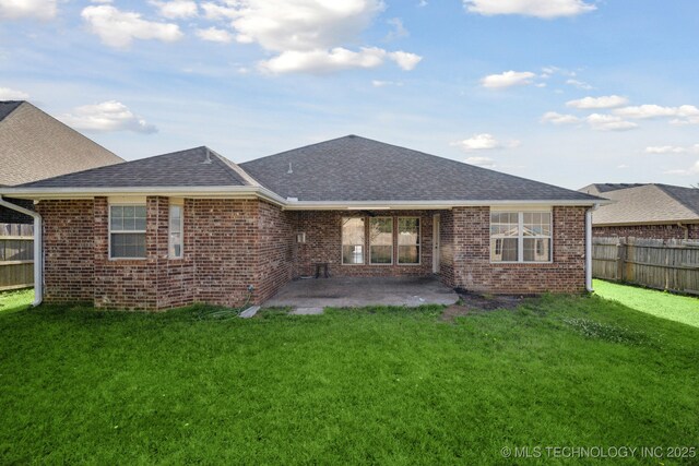 12523 S Cedar Pl, Jenks, OK 74037 - back of property featuring a shingled roof, a patio, and brick siding