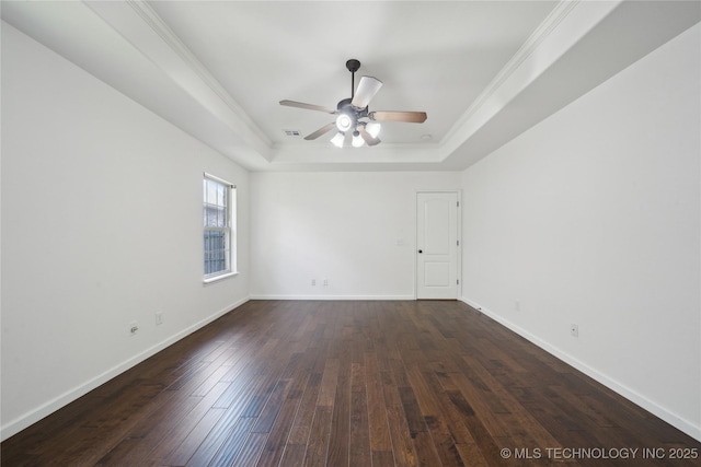 12523 S Cedar Pl, Jenks, OK 74037 - unfurnished room featuring a raised ceiling, a ceiling fan, dark wood-type flooring, baseboards, and crown molding