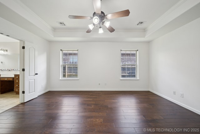 12523 S Cedar Pl, Jenks, OK 74037 - unfurnished room with a raised ceiling, ornamental molding, plenty of natural light, and ceiling fan