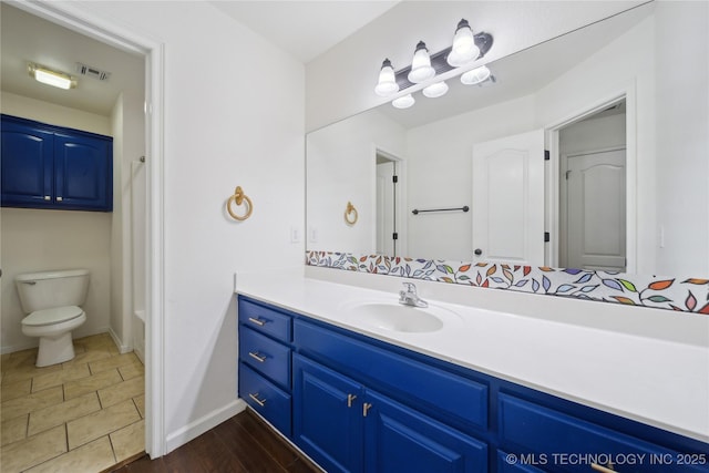 12523 S Cedar Pl, Jenks, OK 74037 - bathroom with vanity, toilet, and baseboards