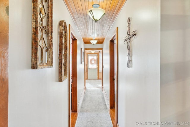 16881 S 4220th Rd, Claremore, OK 74017 - hall featuring wood ceiling, baseboards, and carpet floors