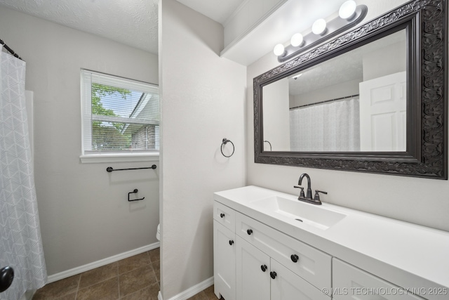 128 Suburban Ln, Inola, OK 74036 - bathroom featuring baseboards, vanity, and toilet