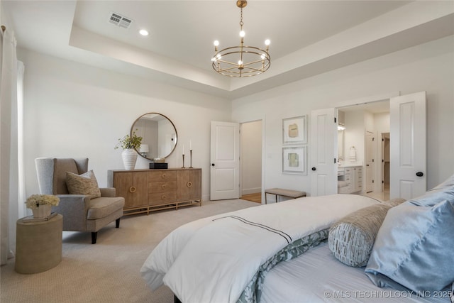 2338 E 134th St S, Bixby, OK 74008 - bedroom featuring a chandelier, light carpet, a tray ceiling, ensuite bathroom, and recessed lighting