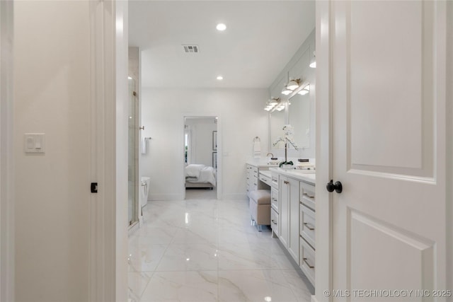 2338 E 134th St S, Bixby, OK 74008 - full bath featuring vanity, ensuite bath, marble tiled floors, a shower stall, and recessed lighting