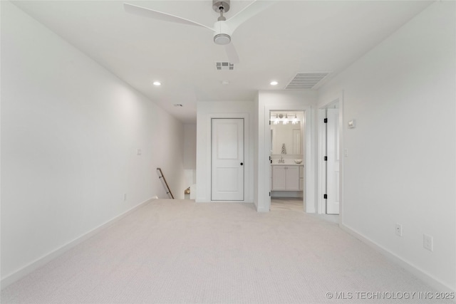 2338 E 134th St S, Bixby, OK 74008 - unfurnished bedroom featuring light colored carpet, recessed lighting, ensuite bath, and a ceiling fan