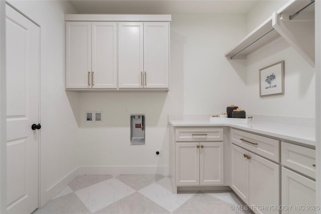 2338 E 134th St S, Bixby, OK 74008 - laundry room featuring hookup for an electric dryer, cabinet space, and hookup for a washing machine