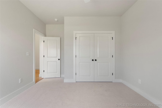 2338 E 134th St S, Bixby, OK 74008 - unfurnished bedroom featuring carpet flooring and a closet