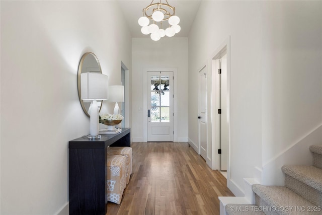 2338 E 134th St S, Bixby, OK 74008 - entryway featuring a chandelier, wood finished floors, and stairs