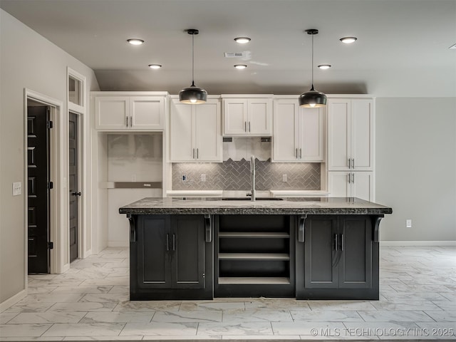 13155 S 105th E Ave, Bixby, OK 74008 - kitchen with light marble finish floors, baseboards, white cabinetry, a sink, and recessed lighting