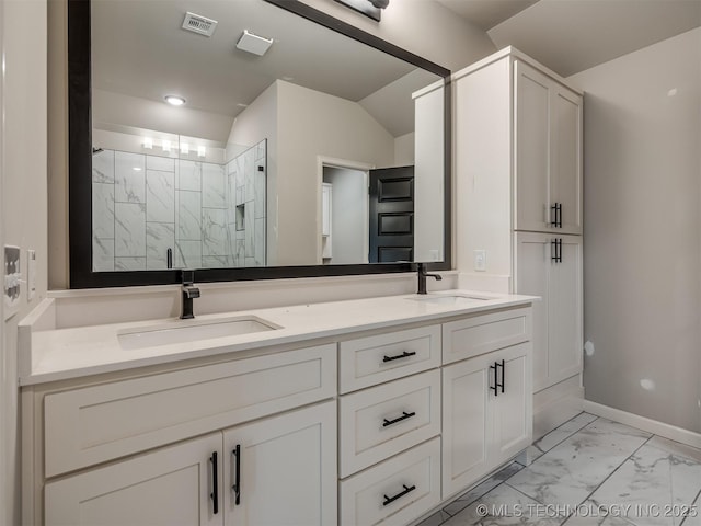 13155 S 105th E Ave, Bixby, OK 74008 - full bath with a marble finish shower, marble finish floors, double vanity, baseboards, and lofted ceiling