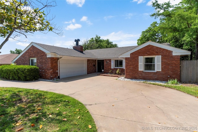 7532 E 55th Pl, Tulsa, OK 74145 - single story home with brick siding, a garage, concrete driveway, and a chimney