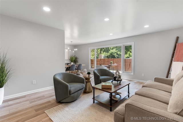 7532 E 55th Pl, Tulsa, OK 74145 - living area featuring light wood-style floors, recessed lighting, baseboards, and a chandelier