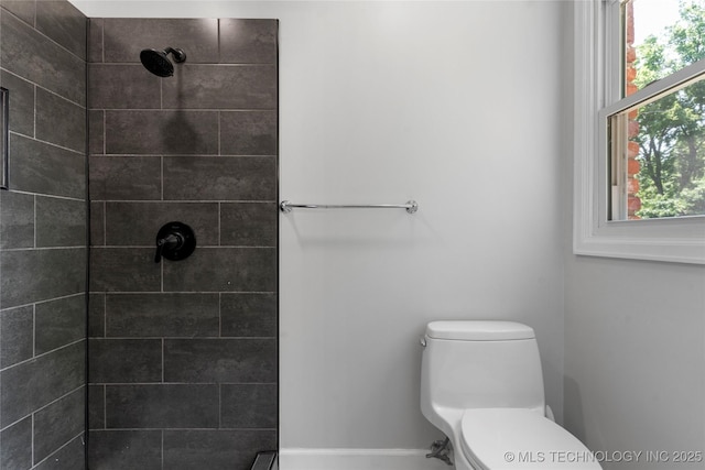 7532 E 55th Pl, Tulsa, OK 74145 - full bathroom with a tile shower and toilet